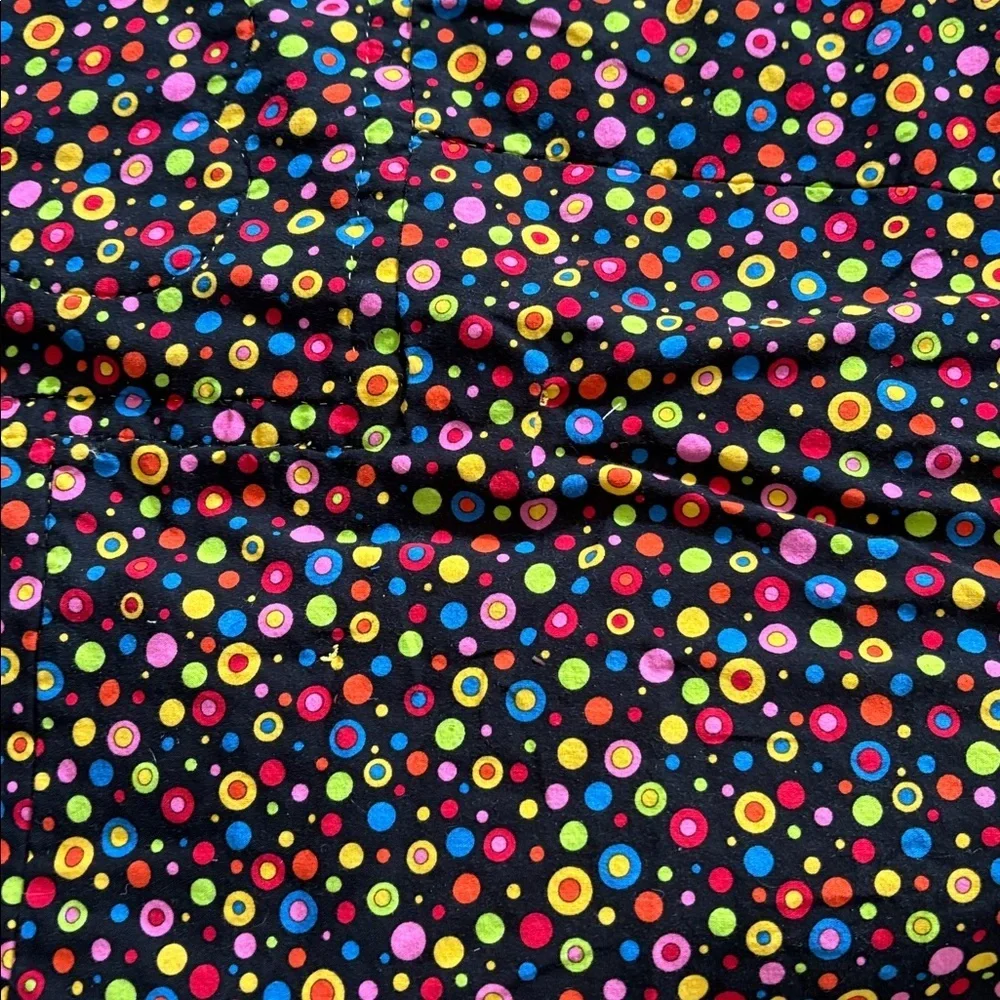 Playful Train-Themed Quilt with Vibrant Accents